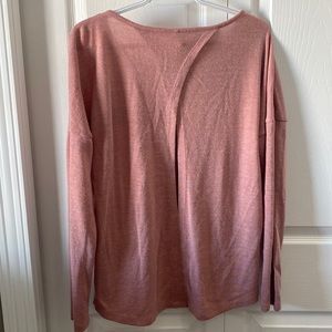 ONLY light pink sweater size S . Zipper on front & slit i the back.